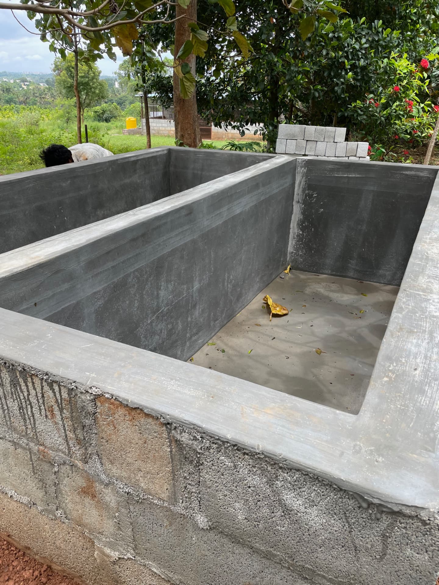 Newly built two-chamber cement vermicompost pit at the farm